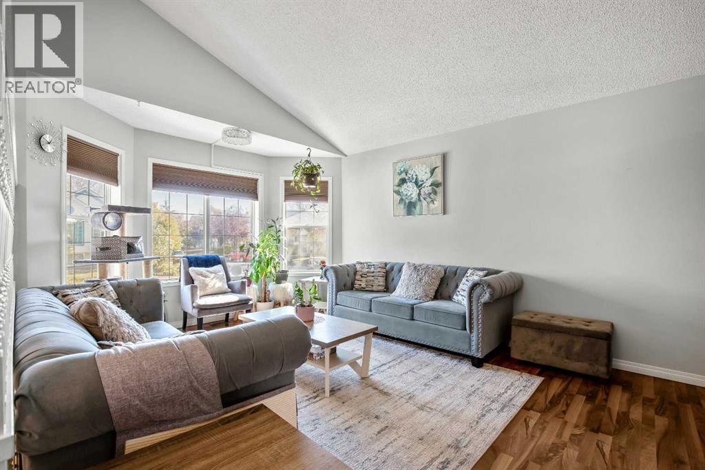 Single Family House Bi-level for Sale in  Mt Allan Circle SE McKenzie Lake Calgary 