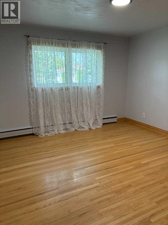Single Family House Bungalow for Sale in  Kirby Place SW Kingsland Calgary 