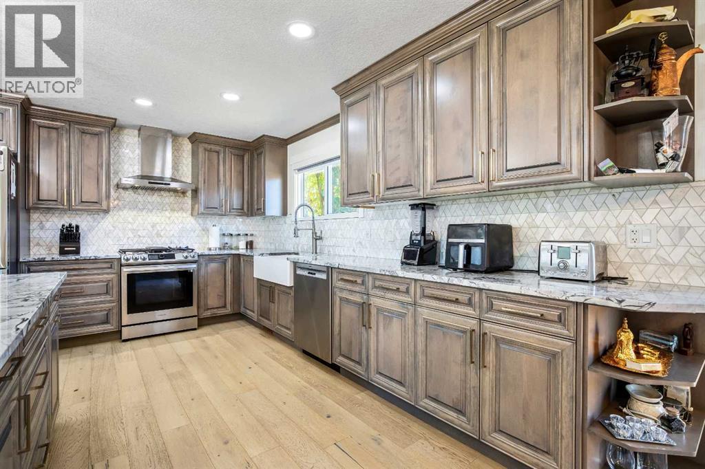 Single Family House 4 Level for Sale in  Pinemill Way NE Pineridge Calgary 