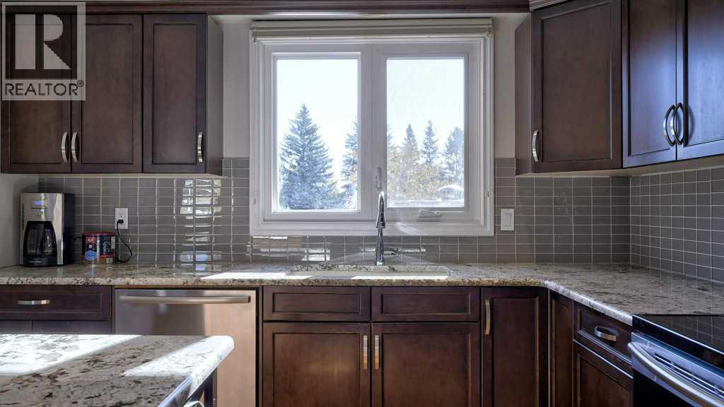 Single Family House Bungalow for Sale in  Brenner Crescent NW Brentwood Calgary 