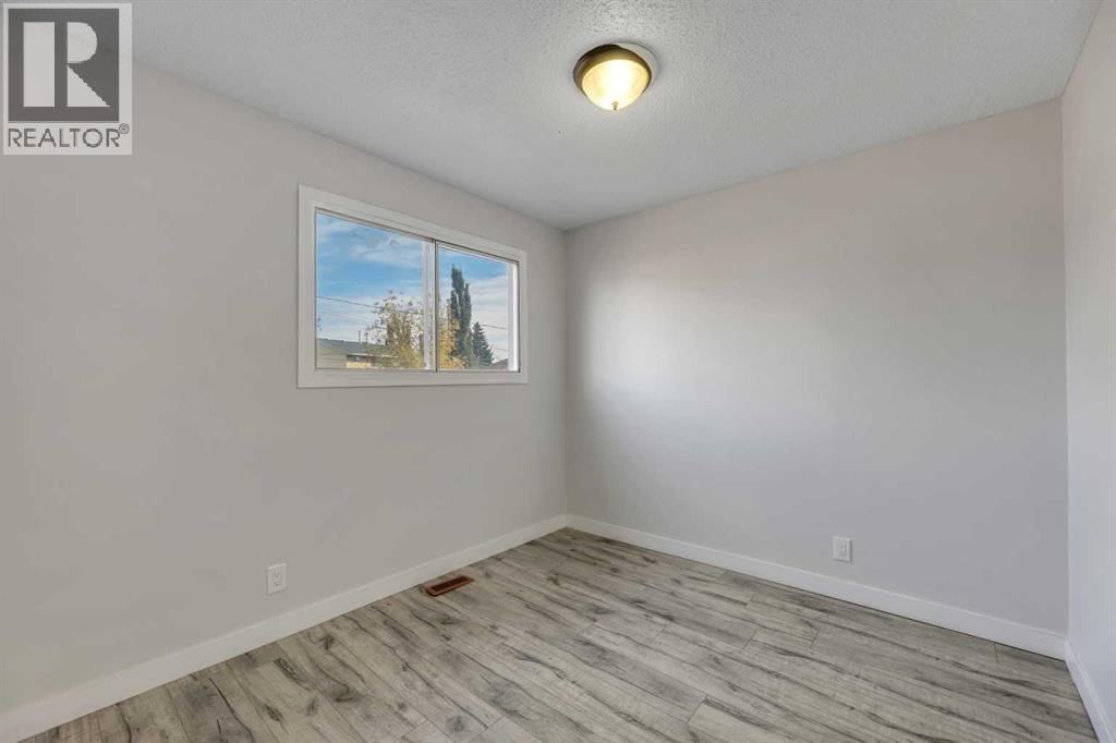 Single Family House Bi-level for Sale in  Marbank Drive NE Marlborough Calgary 