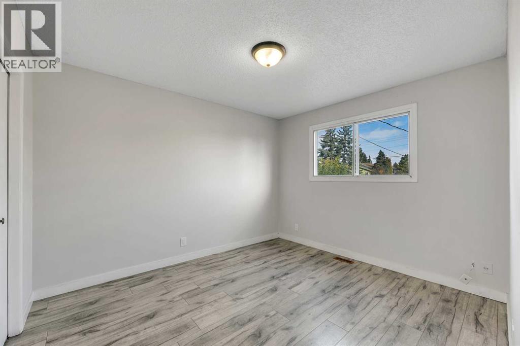 Single Family House Bi-level for Sale in  Marbank Drive NE Marlborough Calgary 