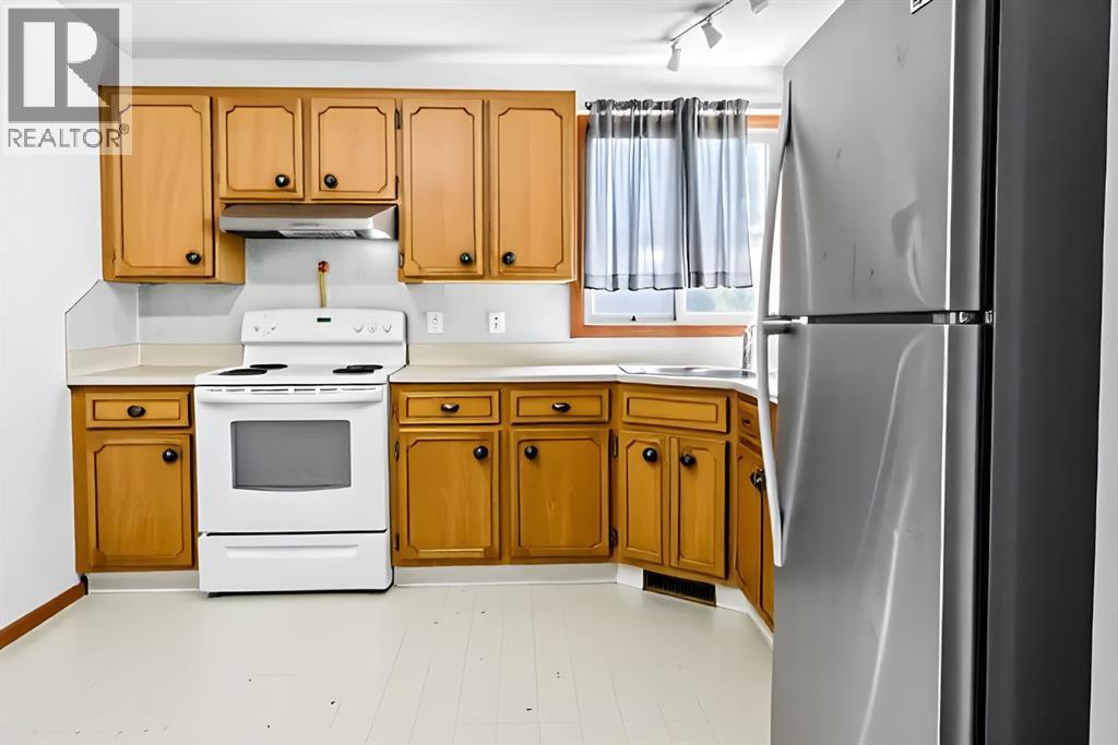 Multi-family House Bi-level for Sale in  &  Dalton Bay NW Dalhousie Calgary 
