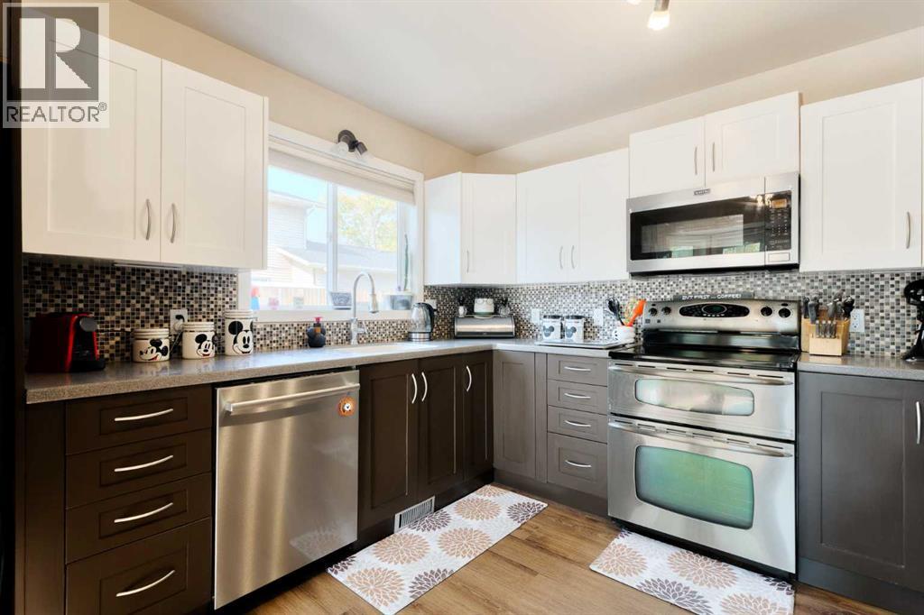 Single Family House 4 Level for Sale in  Macewan Meadow Way NW MacEwan Glen Calgary 