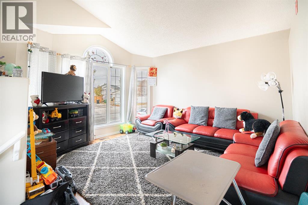 Single Family House 4 Level for Sale in  Laguna Way NE Monterey Park Calgary 
