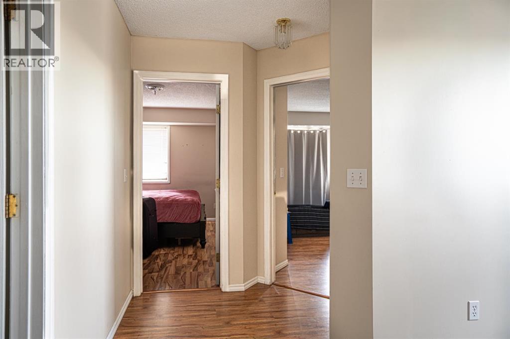 Single Family House 4 Level for Sale in  Laguna Way NE Monterey Park Calgary 