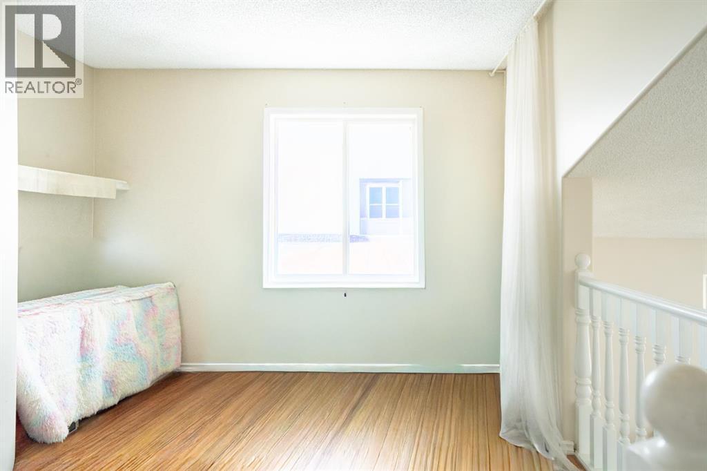 Single Family House 4 Level for Sale in  Laguna Way NE Monterey Park Calgary 
