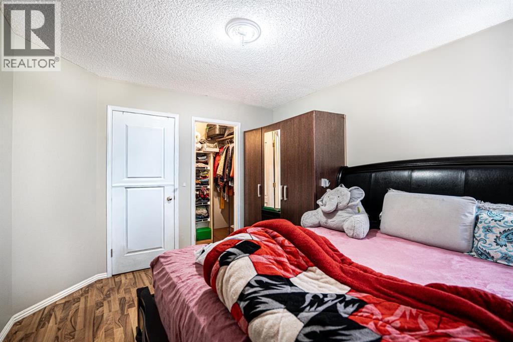 Single Family House 4 Level for Sale in  Laguna Way NE Monterey Park Calgary 