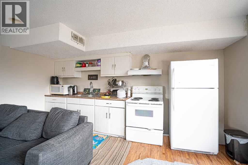 Single Family House 4 Level for Sale in  Laguna Way NE Monterey Park Calgary 