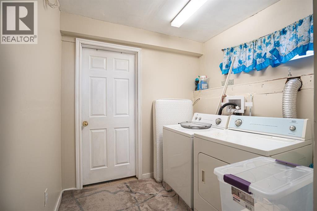 Single Family House 4 Level for Sale in  Laguna Way NE Monterey Park Calgary 