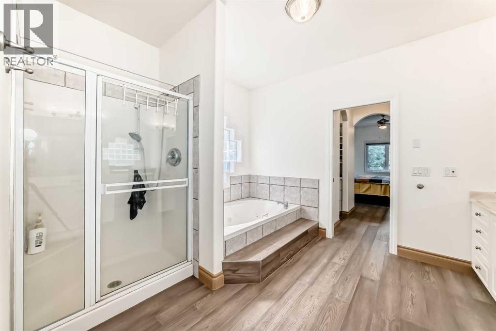 Single Family House Bungalow for Sale in  Simcoe Gate SW Signal Hill Calgary 