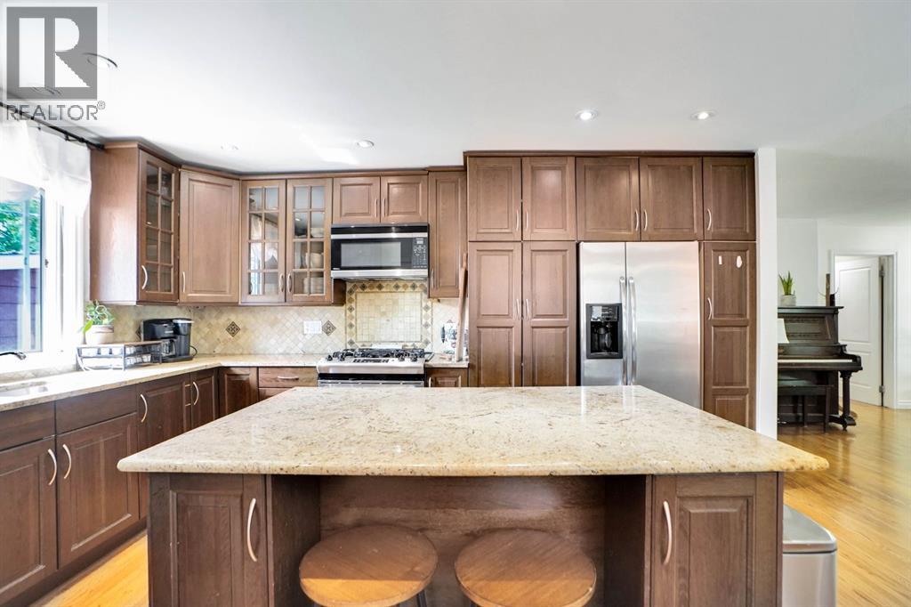 Single Family House Bungalow for Sale in  Northmount Drive NW Brentwood Calgary 