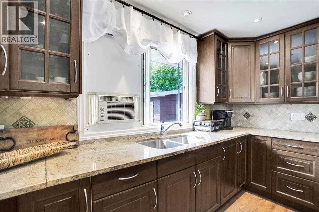 Single Family House Bungalow for Sale in  Northmount Drive NW Brentwood Calgary 