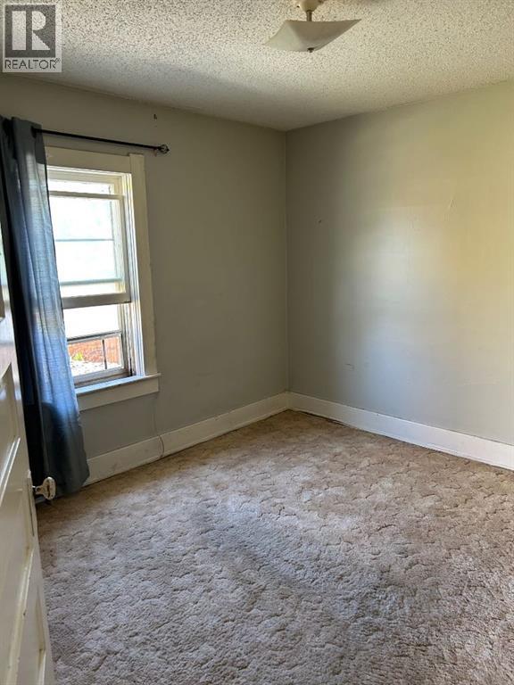 Single Family House for Sale in   Street S Victoria Park Lethbridge 