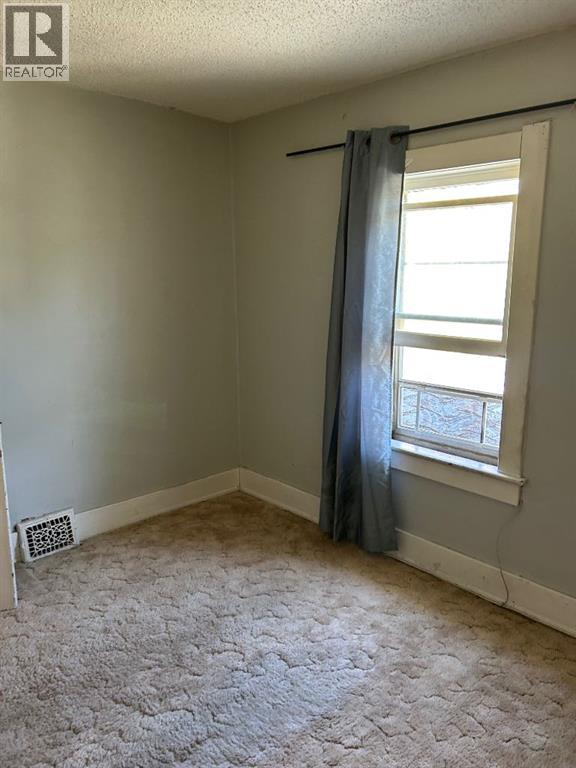 Single Family House for Sale in   Street S Victoria Park Lethbridge 