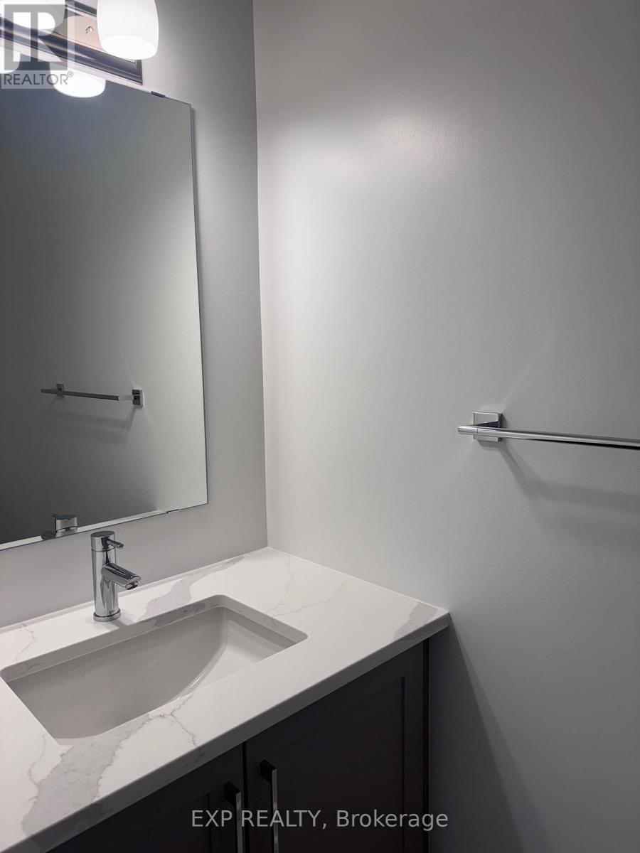 Powder room with quartz counters