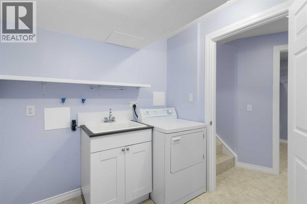 Single Family House 4 Level for Sale in  Eversyde Circle SW Evergreen Calgary 
