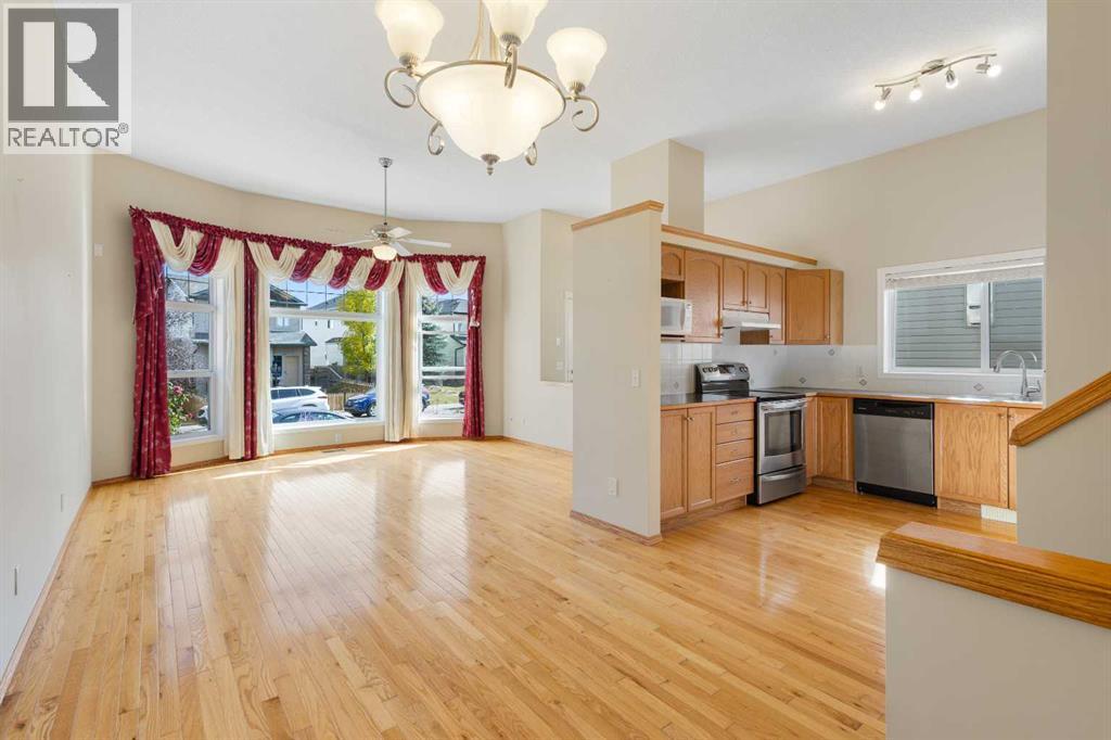 Single Family House 4 Level for Sale in  Eversyde Circle SW Evergreen Calgary 