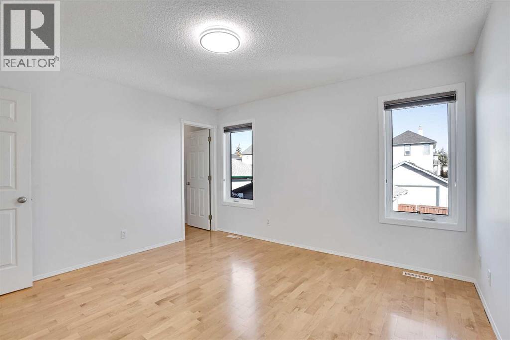 Single Family House 3 Level for Sale in  Arbour Grove Close NW Arbour Lake Calgary 