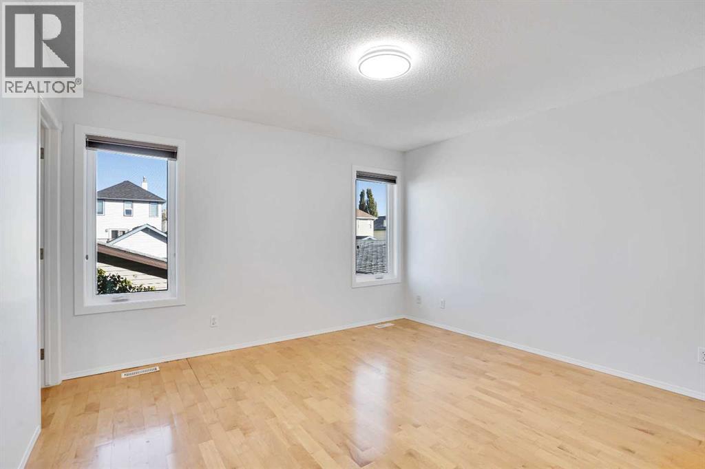 Single Family House 3 Level for Sale in  Arbour Grove Close NW Arbour Lake Calgary 