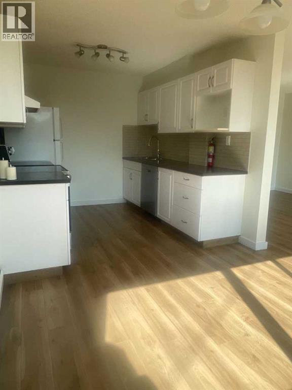 Single Family House Multi-level for Sale in    Avenue SW Kingsland Calgary 