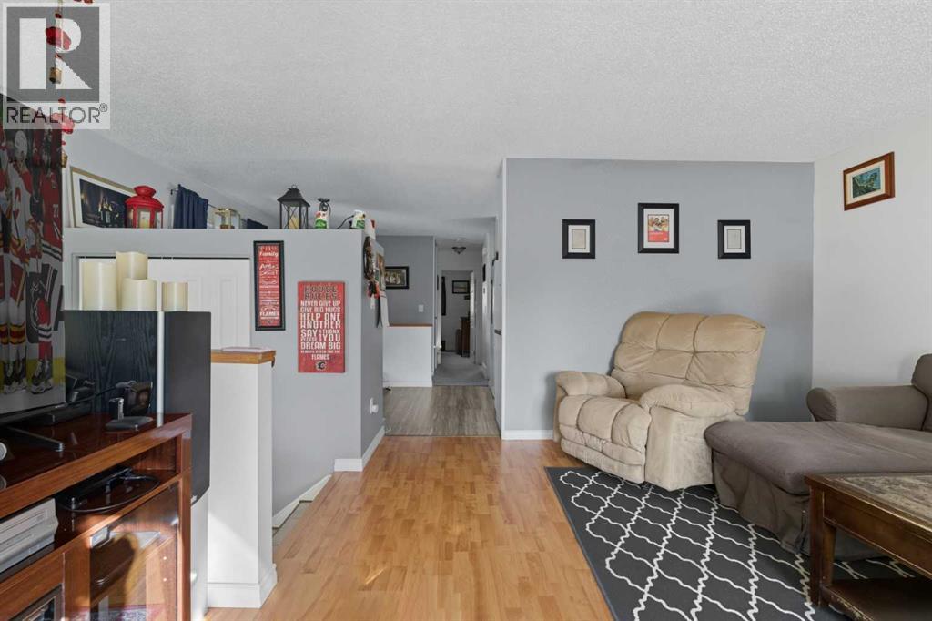 Single Family House Bi-level for Sale in  Sunvale Crescent SE Sundance Calgary 