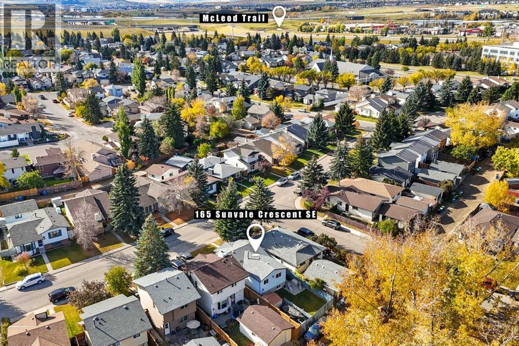 Single Family House Bi-level for Sale in  Sunvale Crescent SE Sundance Calgary 