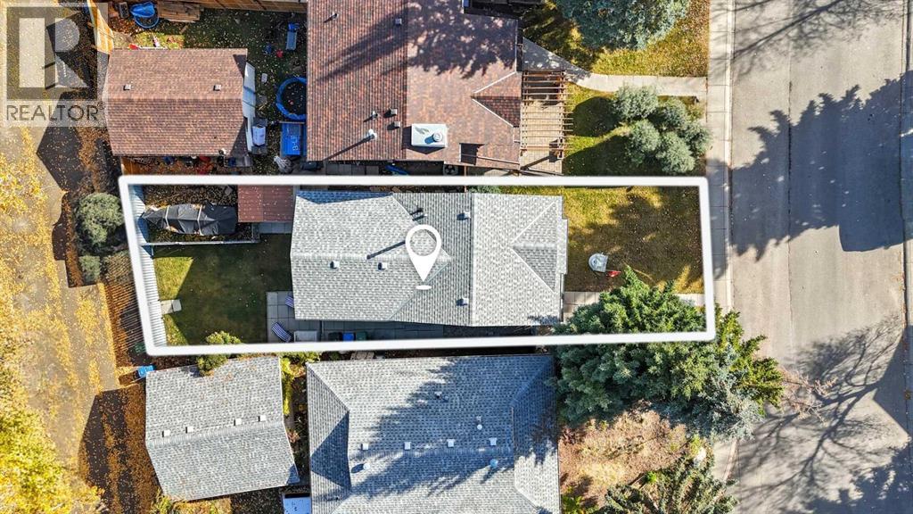 Single Family House Bi-level for Sale in  Sunvale Crescent SE Sundance Calgary 