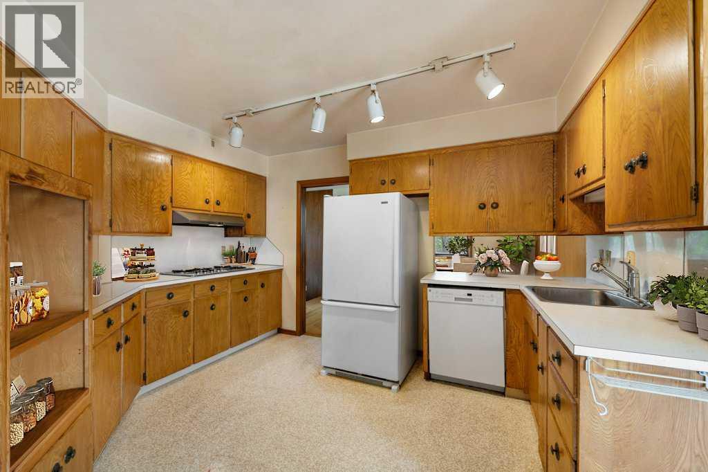 Single Family House Bungalow for Sale in  Brisebois Drive NW Brentwood Calgary 