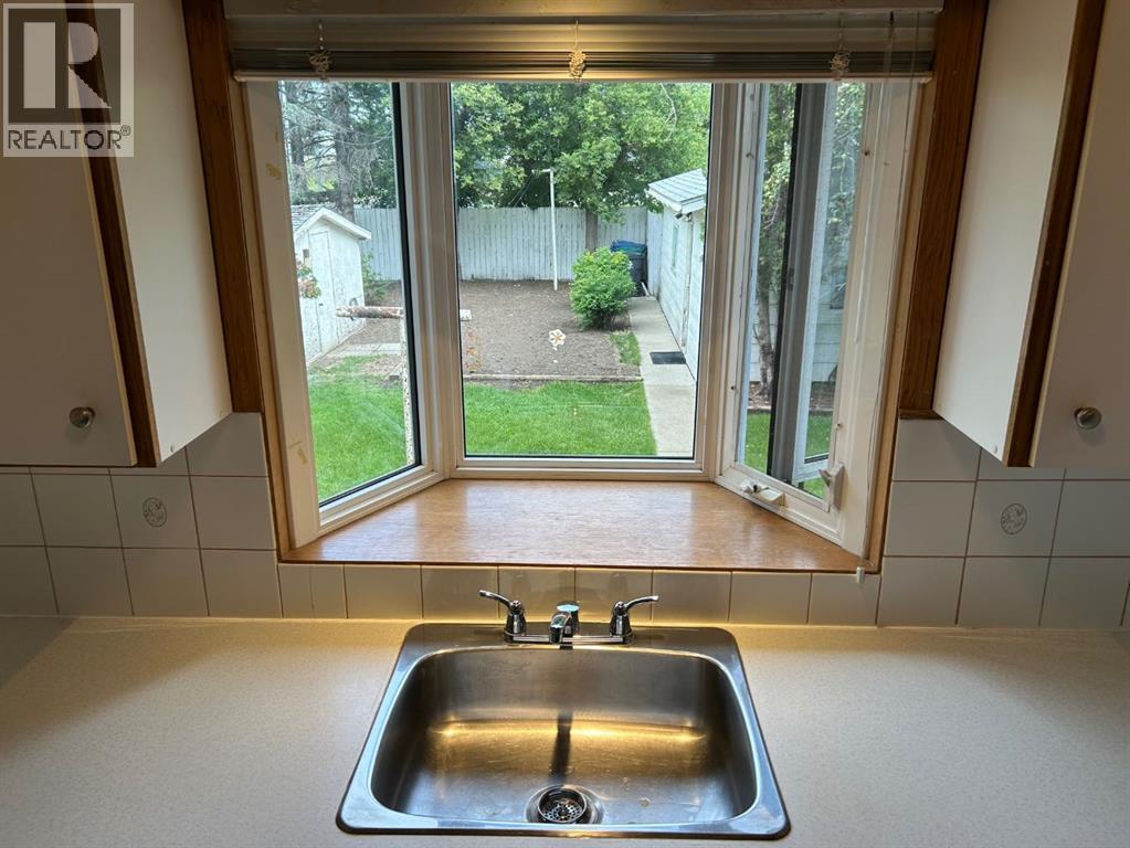 Single Family House Bungalow for Sale in   Street S Glendale Lethbridge 