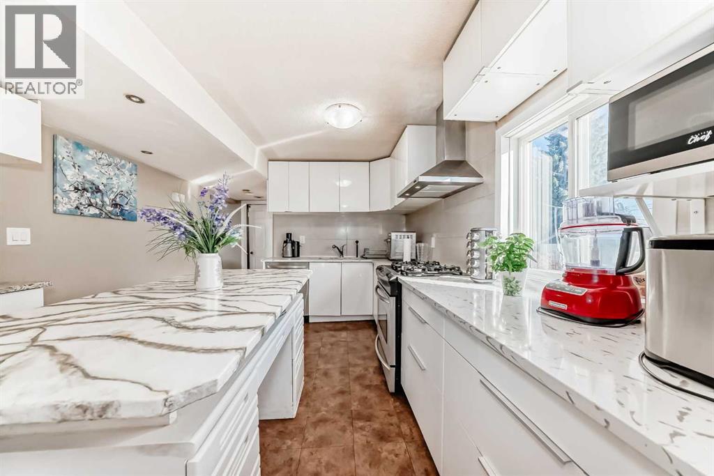 Single Family House for Sale in   Street NW Bowness Calgary 