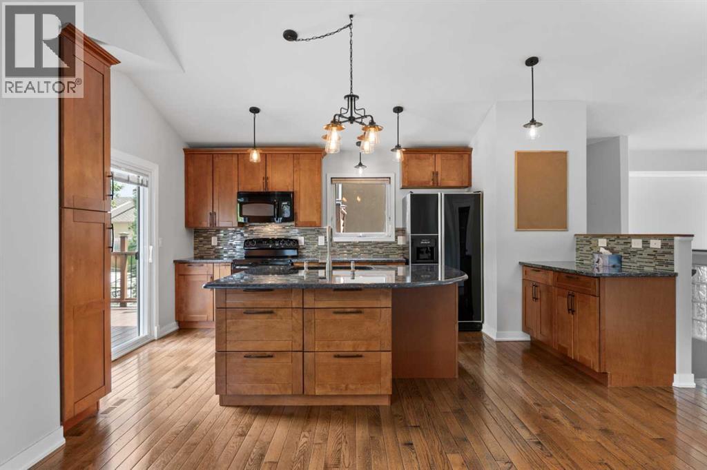 Single Family House Bungalow for Sale in  Arbour Wood Close NW Arbour Lake Calgary 