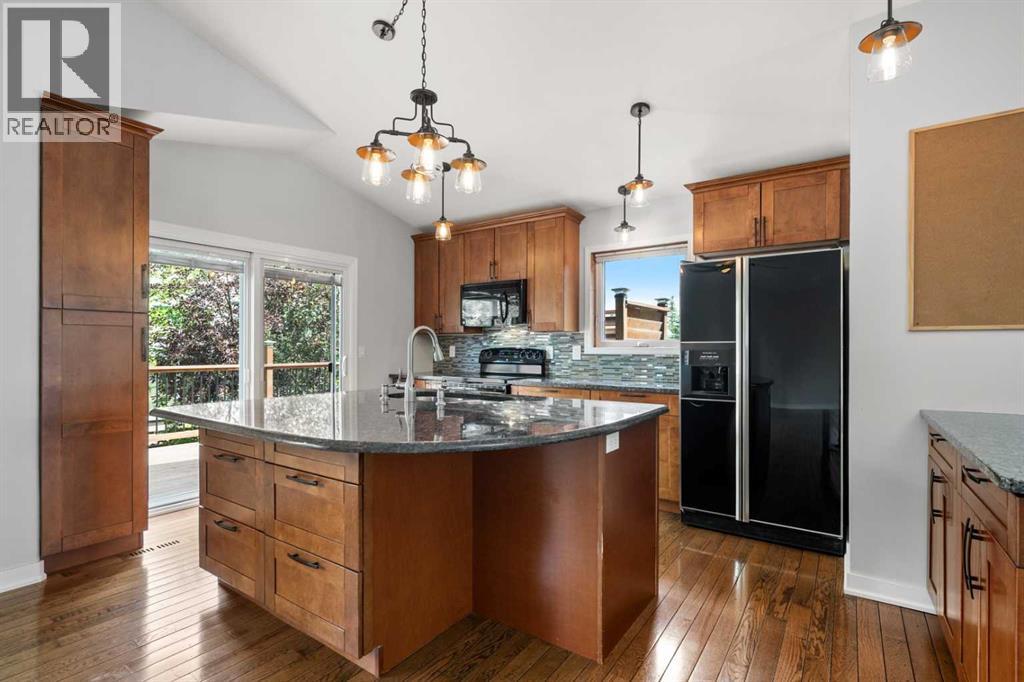 Single Family House Bungalow for Sale in  Arbour Wood Close NW Arbour Lake Calgary 