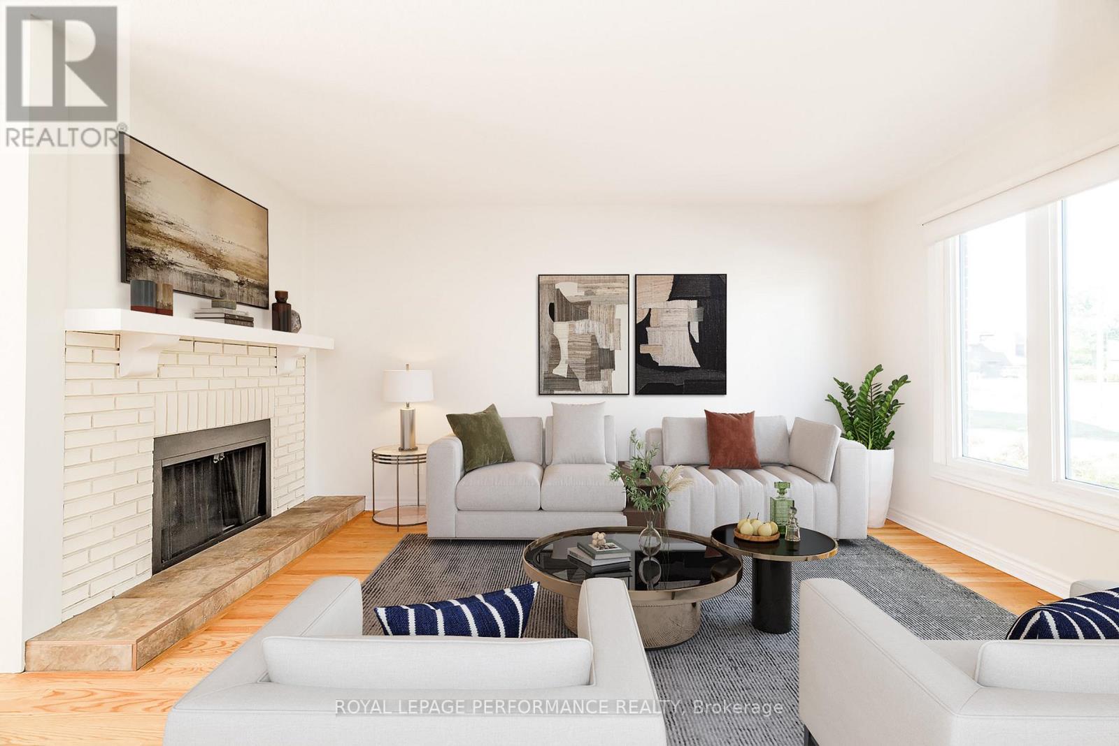 Livingroom with fireplace & picture window