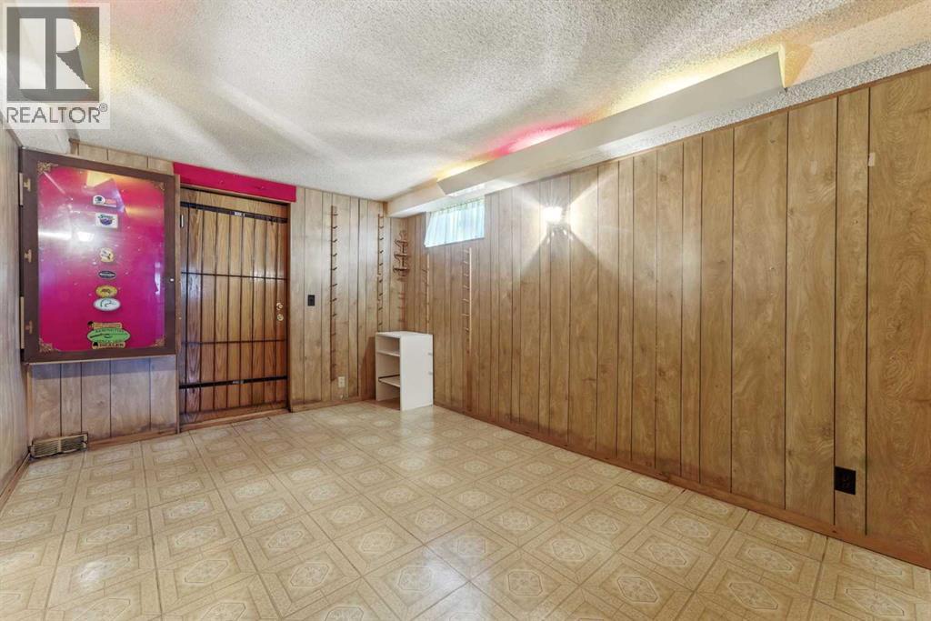 Single Family House Bi-level for Sale in  Madigan Drive NE Marlborough Park Calgary 