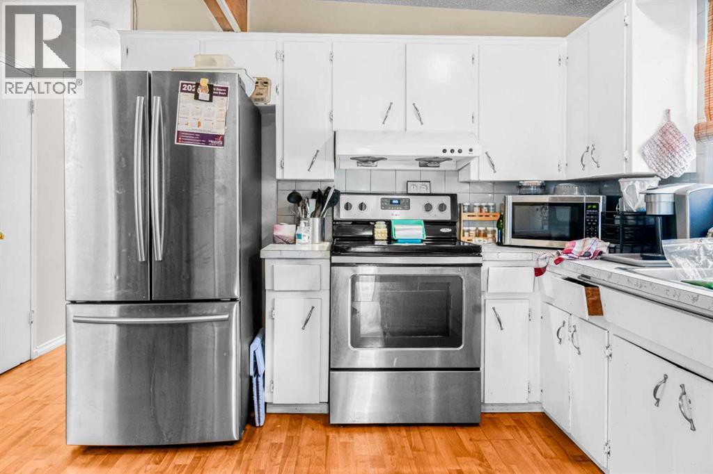 Single Family House Bi-level for Sale in  Penbrooke Drive SE Penbrooke Meadows Calgary 