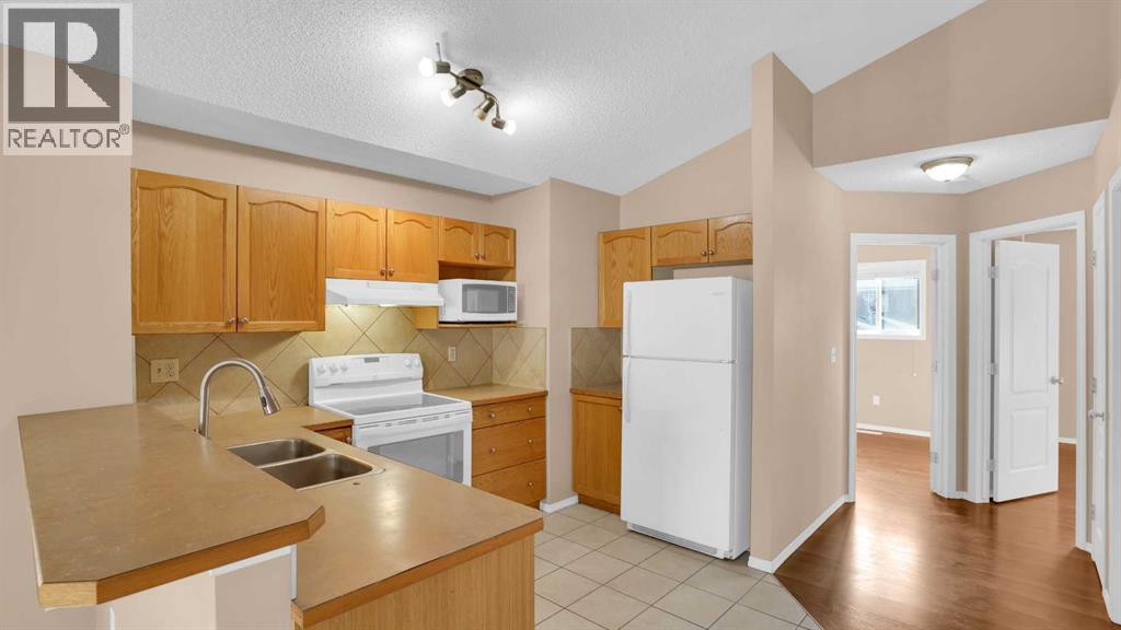 Single Family House Bi-level for Sale in  saddlefield Road NE Taradale Calgary 