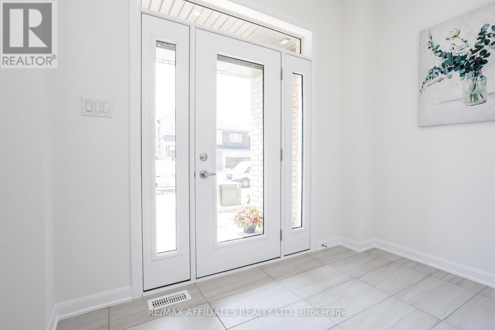 Spacious Modern Tiled Entrance