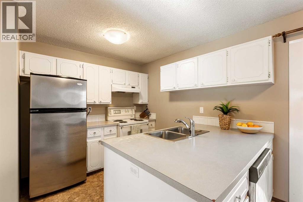 Single Family House for Sale in  Queensland Place SE Queensland Calgary 