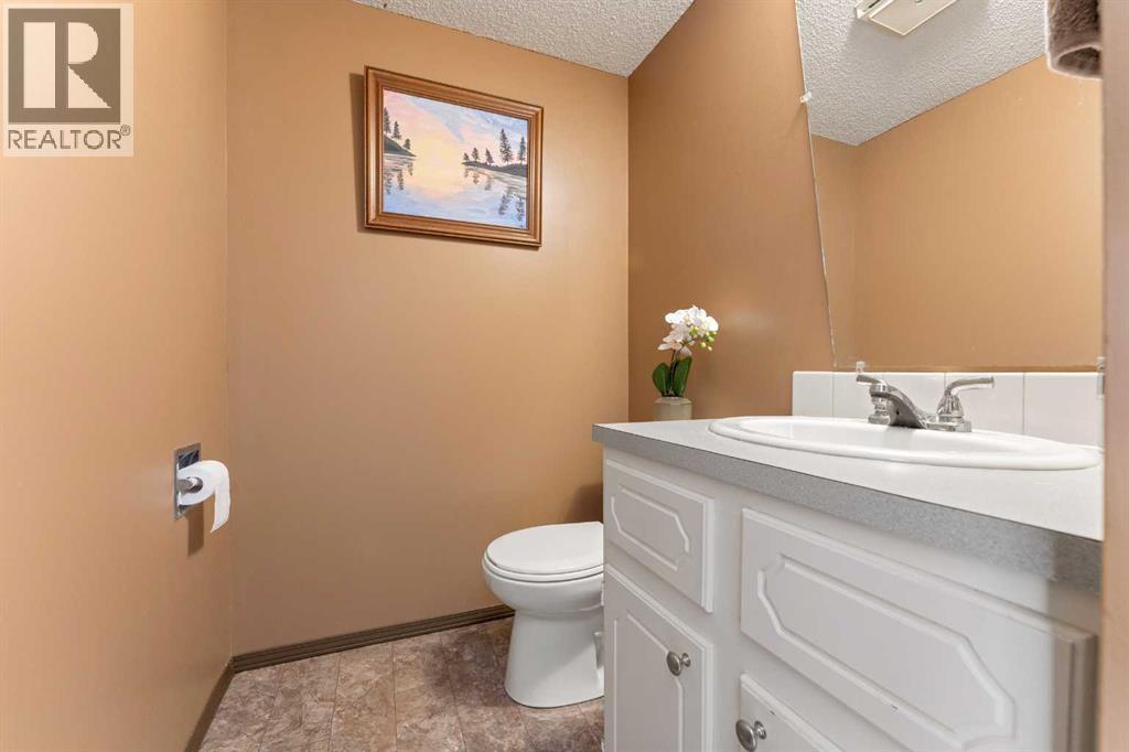 Single Family House for Sale in  Queensland Place SE Queensland Calgary 