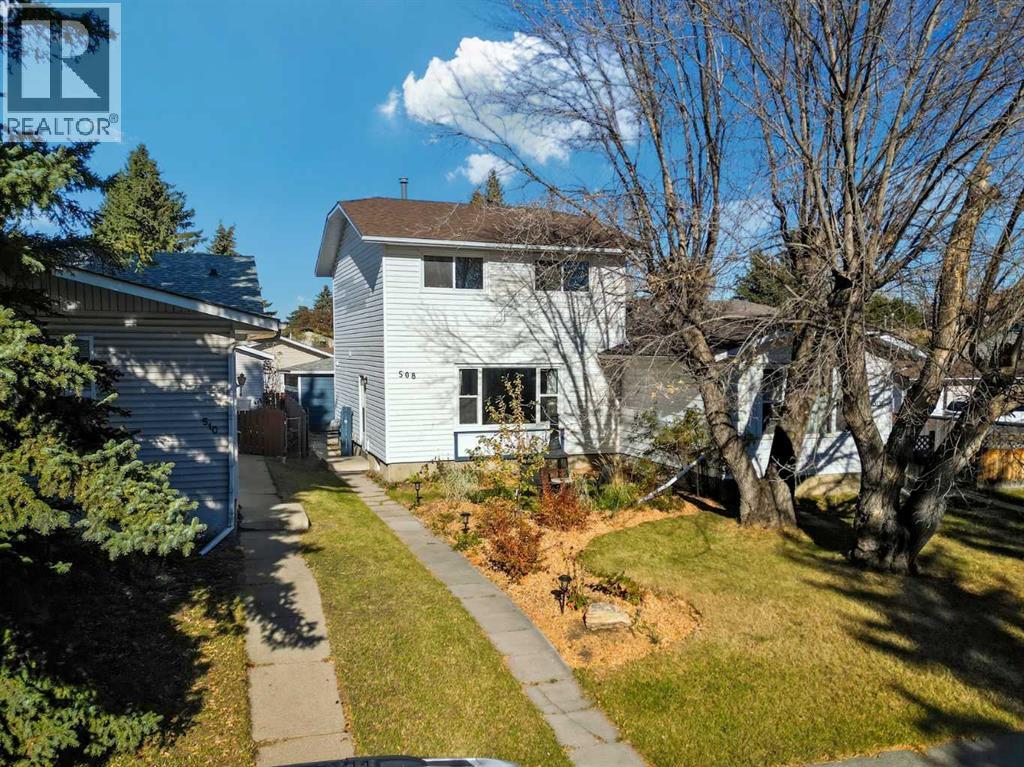 Single Family House for Sale in  Queensland Place SE Queensland Calgary 