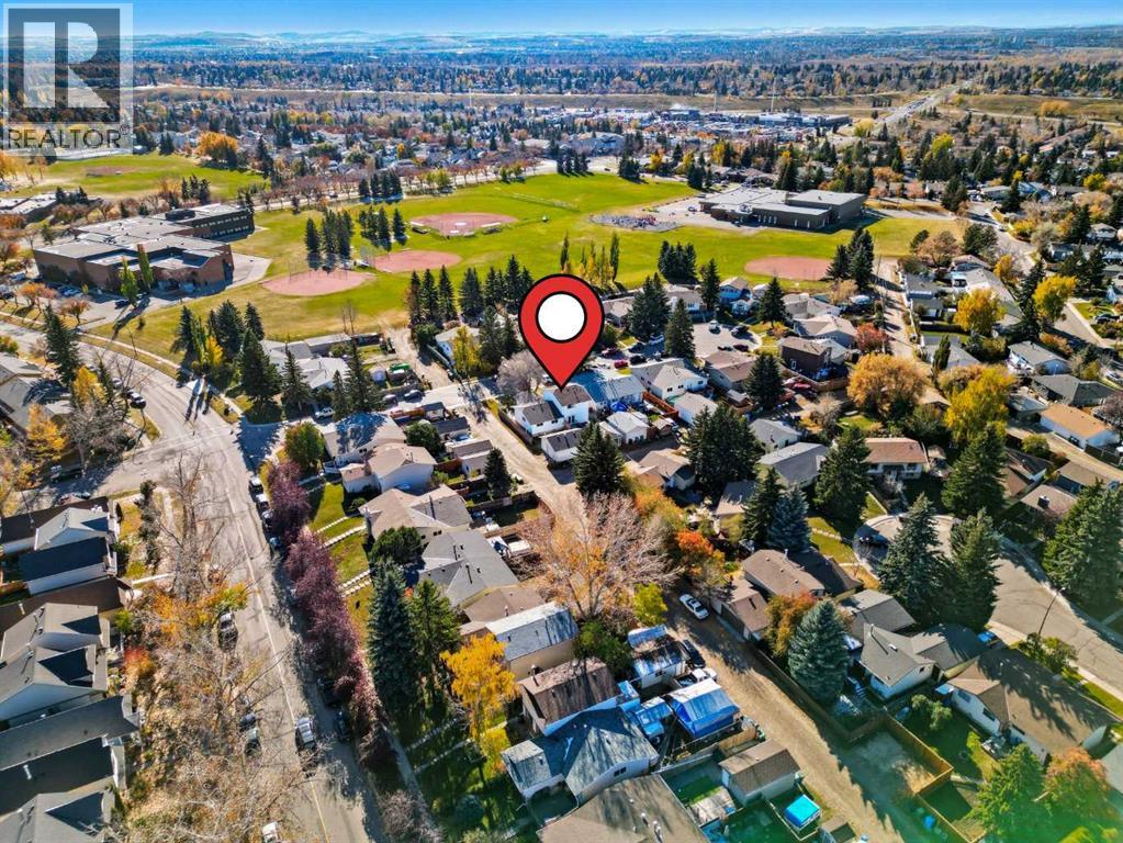 Single Family House for Sale in  Queensland Place SE Queensland Calgary 