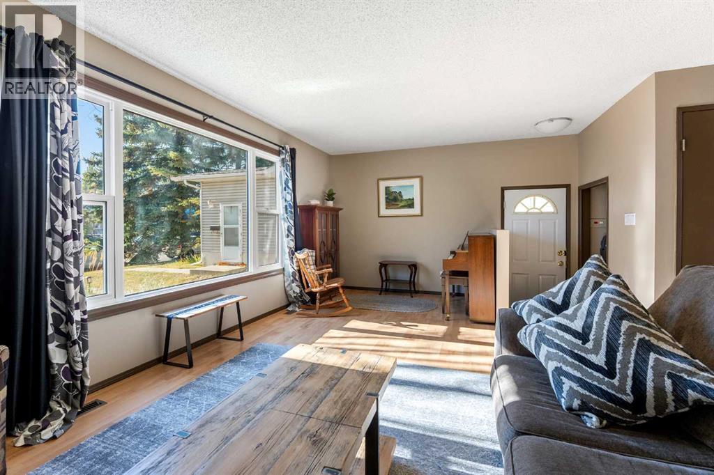 Single Family House for Sale in  Queensland Place SE Queensland Calgary 