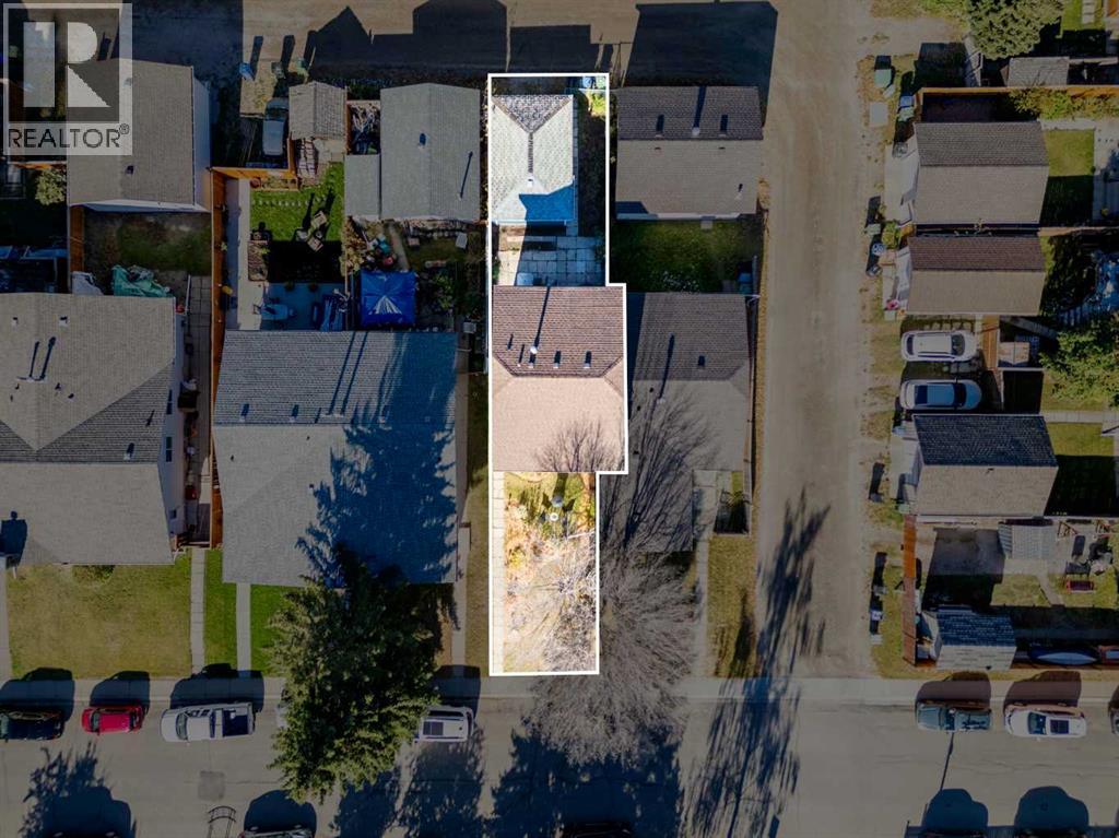 Single Family House for Sale in  Queensland Place SE Queensland Calgary 