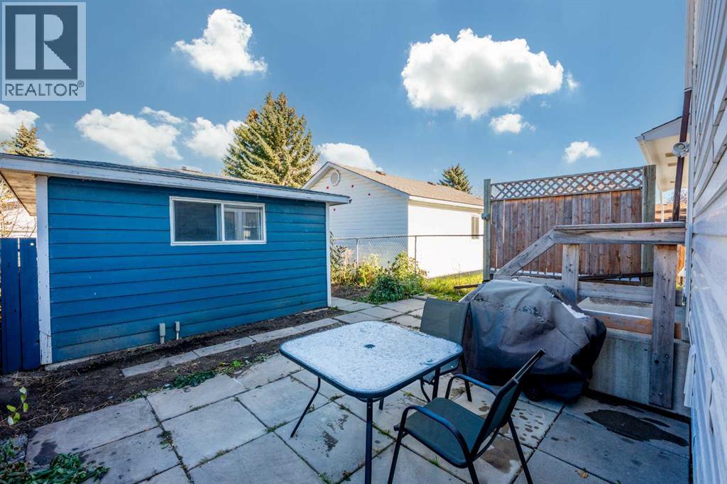 Single Family House for Sale in  Queensland Place SE Queensland Calgary 