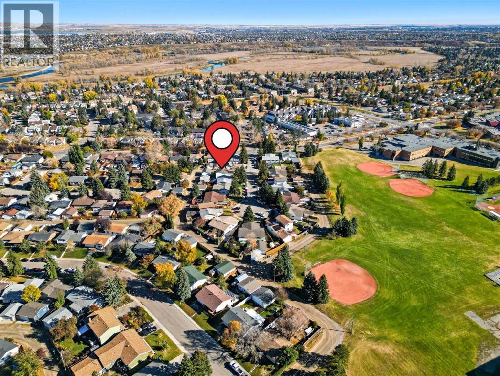 Single Family House for Sale in  Queensland Place SE Queensland Calgary 