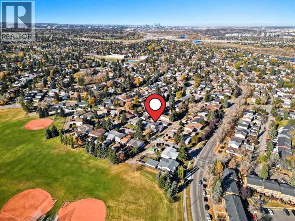 Single Family House for Sale in  Queensland Place SE Queensland Calgary 