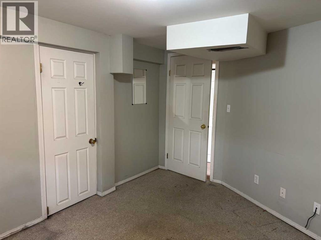 Single Family House Bungalow for Sale in  Halifax Crescent NW Banff Trail Calgary 