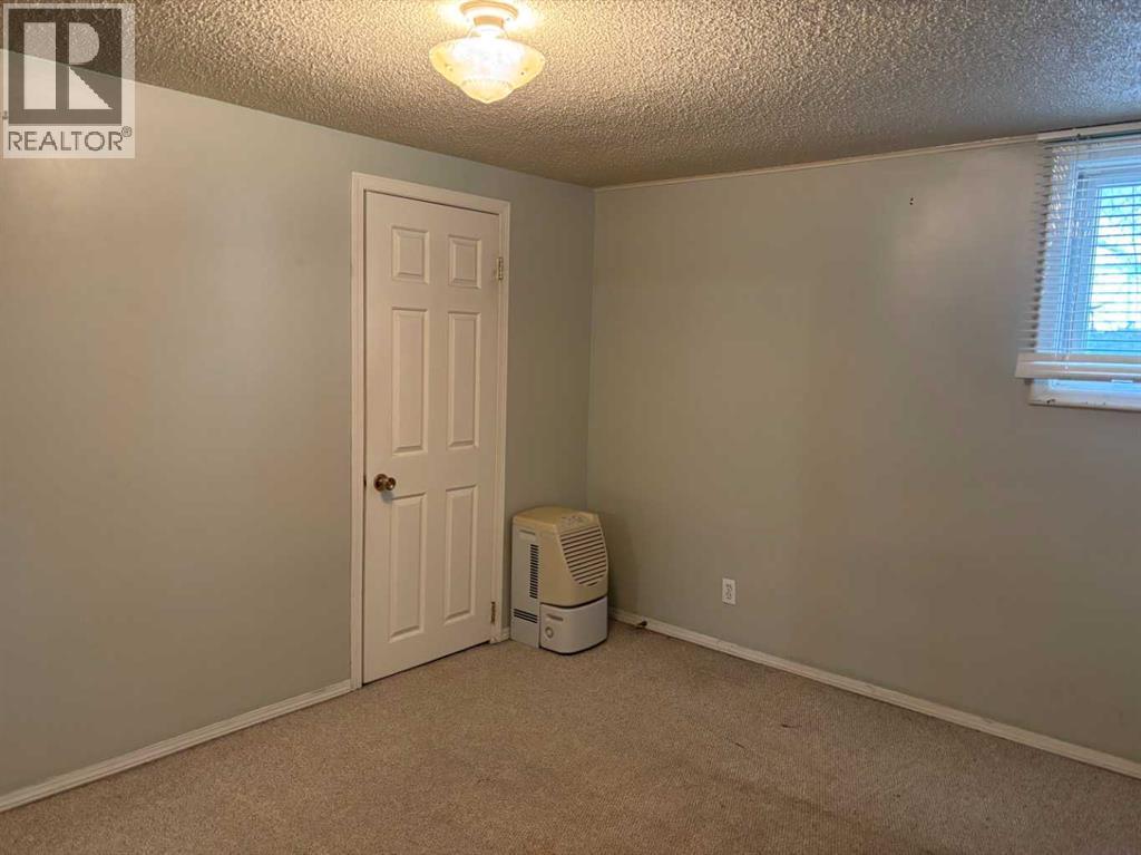 Single Family House Bungalow for Sale in  Halifax Crescent NW Banff Trail Calgary 