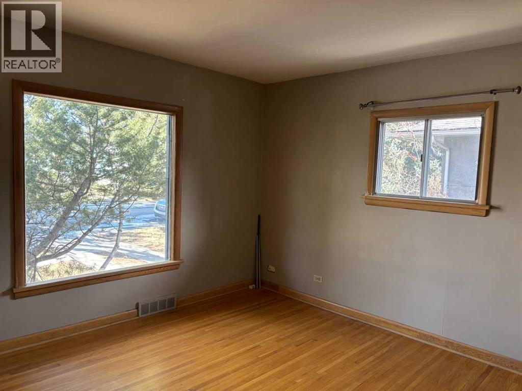 Single Family House Bungalow for Sale in  Halifax Crescent NW Banff Trail Calgary 